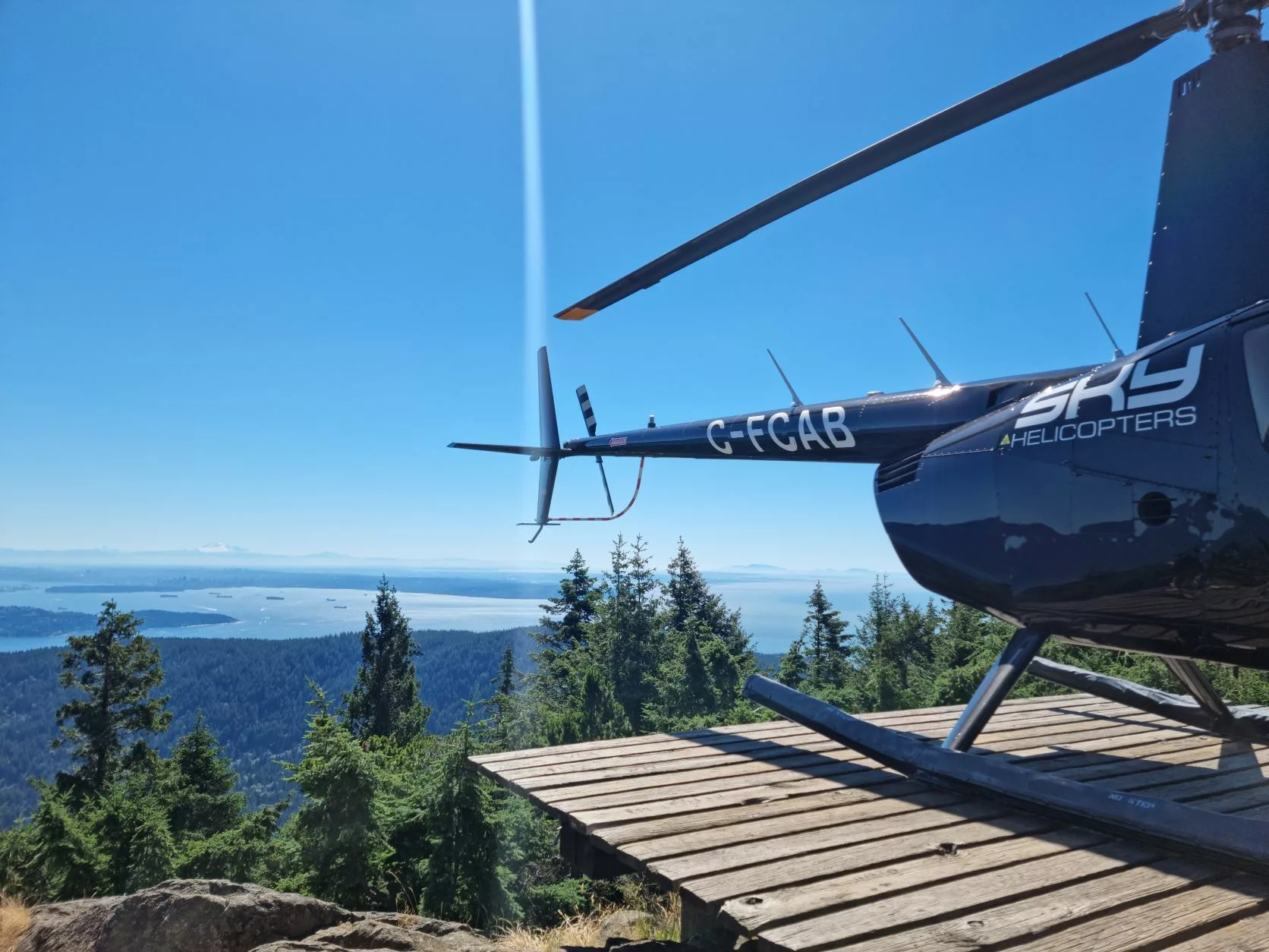 Sky Helicopters at the summit of Mt. Gardner on Bowen Island BC